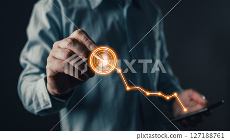 Driving success through focus and precision, this concept represents targeting growth and achieving business goals using technology and innovation as key enablers in a competitive environment. 127188761