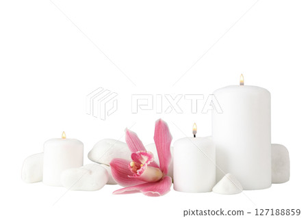 White candles and a pink orchid create calm, isolated on white White candles and a pink orchid create calm, isolated on white 127188859