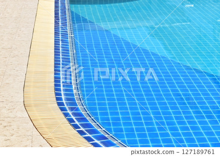 surface of blue swimming pool with water drain surface of blue swimming pool with water drain 127189761