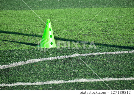 artificial grass soccer field with green training cone artificial grass soccer field with green training cone 127189812