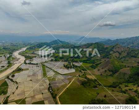 Aerial view of farmlands and riverbanks in the Philippines. Mindanao. 127190114