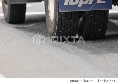 Ruts on a busy road 127190773