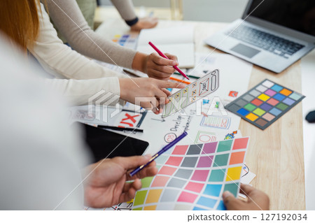 team of UI UX web designer are working together to develop mobile responsive websites with UI UX front end designer previews team of UI UX web designer are working together to develop mobile responsive websites with UI UX front end designer previews 127192034