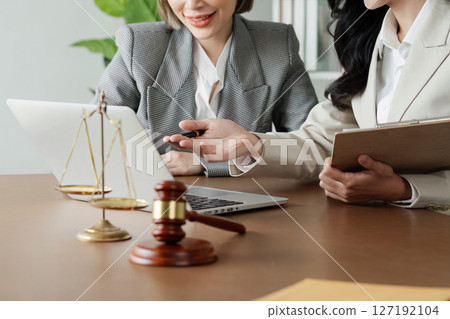 Lawyer working with client discussing contract document in office, consulting to help customer 127192104