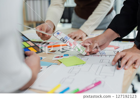 UI designer and UX developer brainstorm idea to design the application interface. Creative digital development agency. UX UI concept 127192123