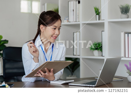 Accountant working on financial data analysis dashboard on paper as marketing indication for business strategic planning 127192231