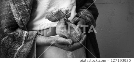 Male hands holding a bag 127193920