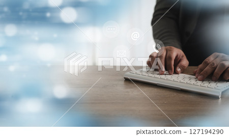 Call center person typing wireless keyboard  127194290
