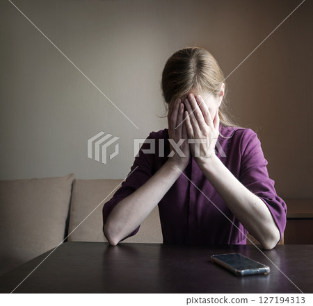 Sad girl praying to God Sad girl praying to God 127194313