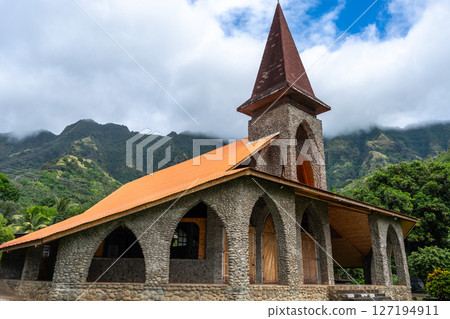 Vaitahu catholic church in Tahuata, Marquesas Islands, French Polynesia, mountain backdrop Vaitahu catholic church in Tahuata, Marquesas Islands, French Polynesia, mountain backdrop 127194911