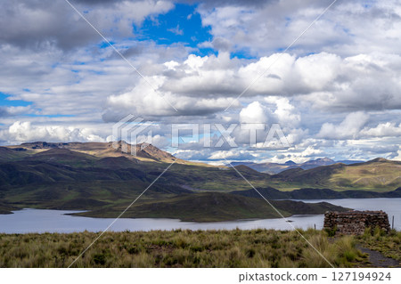 Storm clouds over Lake Lagunillas in the Peruvian highlands 127194924
