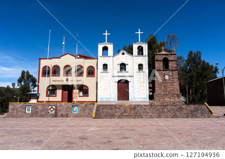 Church and municipal building of Llachon near Lake Titicaca, Peru 127194936