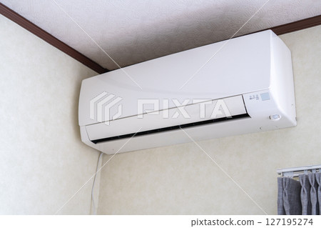 Close-up of an air conditioner installed indoors Close-up of an air conditioner installed indoors 127195274