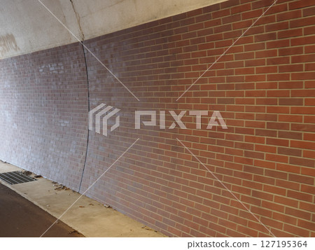 Brick wall of the tunnel. 127195364