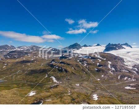 Mountains with snow and glaciers. Road Sognefjellet, Norway Mountains with snow and glaciers. Road Sognefjellet, Norway 127195507