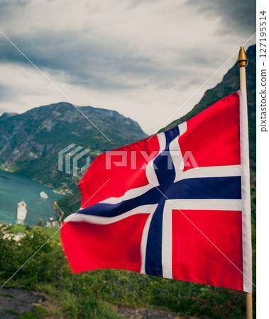 Norwegian flag and Geiranger fjord landscape 127195514