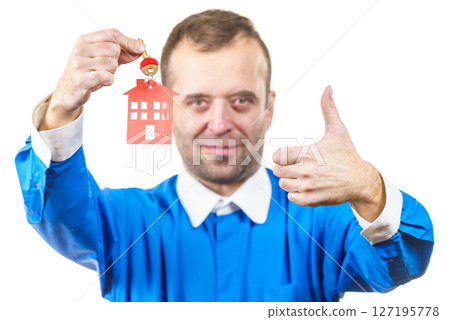 Man holding home keys Man holding home keys 127195778