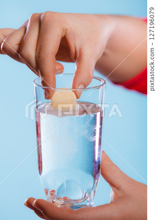 Human hands with vitamin and water. Health care. Human hands with vitamin and water. Health care. 127196079