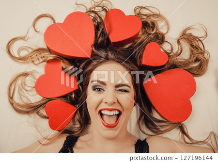 Woman in lingerie in bed. Valentines day love. 127196144