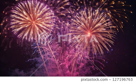 Amazing colorful display of fireworks on black backgound. Celebration concept, banners, cards 127196763