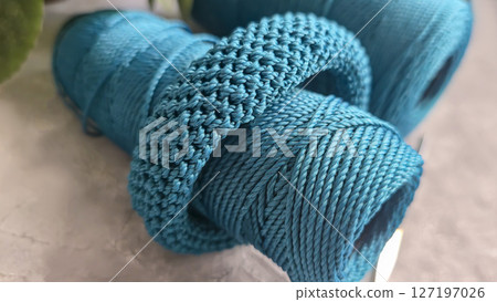 Knitting a cord product with a crochet hook. Step-by-step instructions. Knitting a cord product with a crochet hook. Step-by-step instructions. 127197026