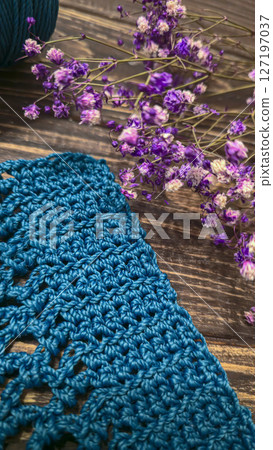 Knitting a cord product with a crochet hook. Step-by-step instructions. 127197037