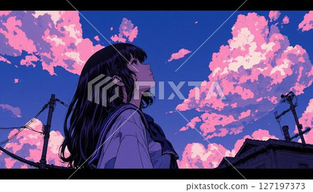 Woman looking at the sky at sunset 127197373
