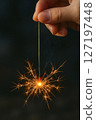 sparklers glowing at night 127197448