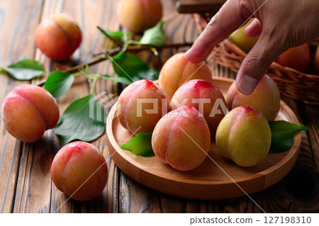 Sweet and sour, delicious plums (early) 127198310