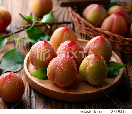 Sweet and sour, delicious plums (early) 127198313