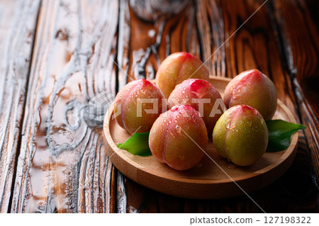 Sweet and sour, delicious plums (early) Sweet and sour, delicious plums (early) 127198322