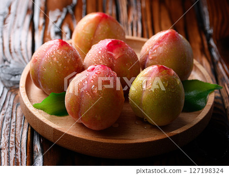 Sweet and sour, delicious plums (early) Sweet and sour, delicious plums (early) 127198324