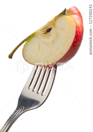 Apple slice on fork isolated on transparent background, fresh fruit snack, healthy eating concept 127200242