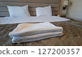 Elegance interior design. Minimalist Bedroom. Modern Hotel Bedroom Interior and bed with pillows. Interior of modern luxury bedroom with furniture. High quality 4k footage 127200357