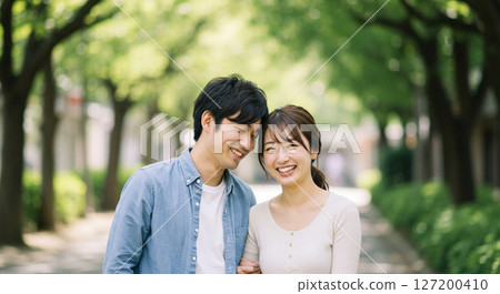 Couple portrait taken in natural light 127200410