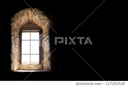 An old window in the dark room An old window in the dark room 127202526