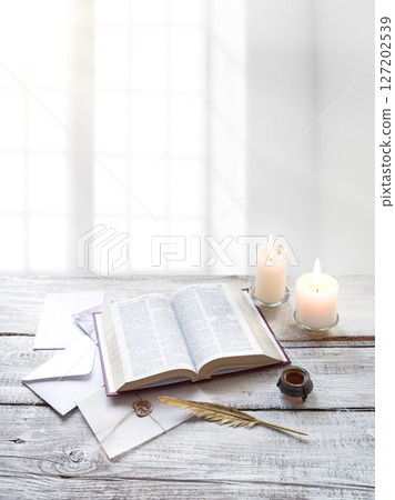 Bible on white wooden table Bible on white wooden table 127202539