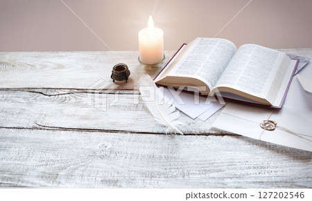 Bible on white wooden table Bible on white wooden table 127202546