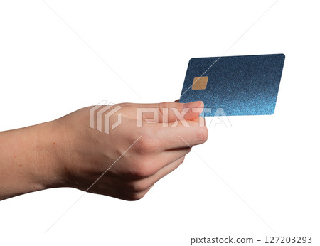 Bank card held in hand, showcasing a shiny blue plastic design with a chip. Customer using the card 127203293