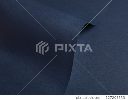 Dark blue matte paper texture with a premium, chic finish, featuring wavy folds and edges. Elegant Dark blue matte paper texture with a premium, chic finish, featuring wavy folds and edges. Elegant 127203333
