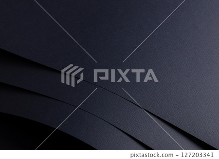 Dark blue matte paper texture with a rich, sleek finish, featuring an abstract, minimal design. 127203341
