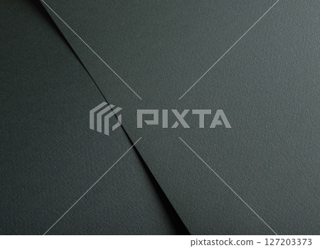 Dark green paper texture with a matte finish. Elegant, minimalistic geometric pattern with simple 127203373