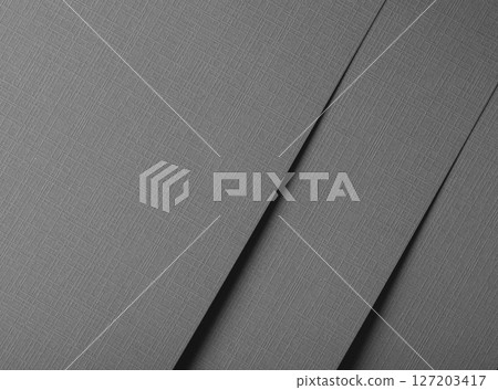 Gray matte paper texture with an embossed, woven pattern, featuring geometric lines and a subtle, 127203417