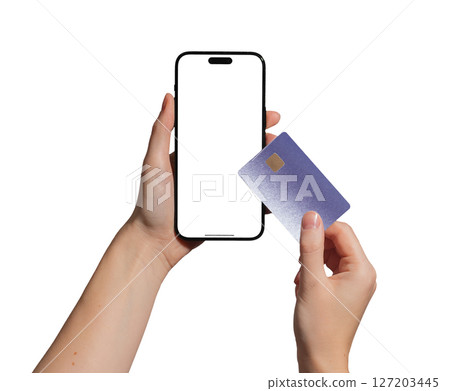 Hand holding a smartphone displaying a bank card for online payment. Cashless transaction, credit, 127203445