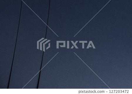 Premium dark blue paper texture with a matte finish. Elegant, minimalistic design with a rich, chic 127203472