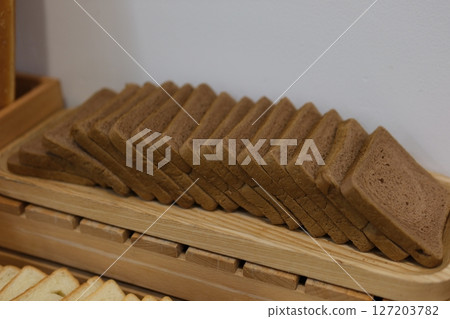 Whole grain bread for toast. Isolate on white background 127203782