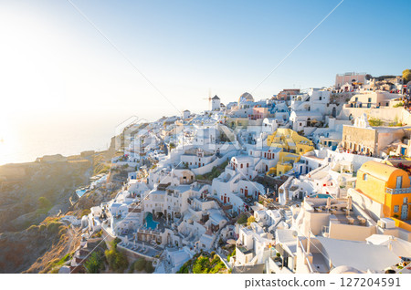 Santorini Oia village, Greece, showcases its iconic white architecture and stunning Aegean Sea views 127204591