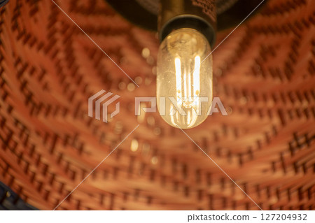 Retro light bulb 127204932