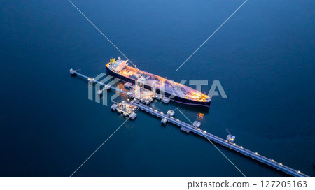 Aerial view LPG gas tanker ship at oil and gas terminal platform, Liquefied Petroleum Gas tanker ship industrial offshore oil gas terminal tanker ship LPG tanker ship loading arm loading and unloading 127205163