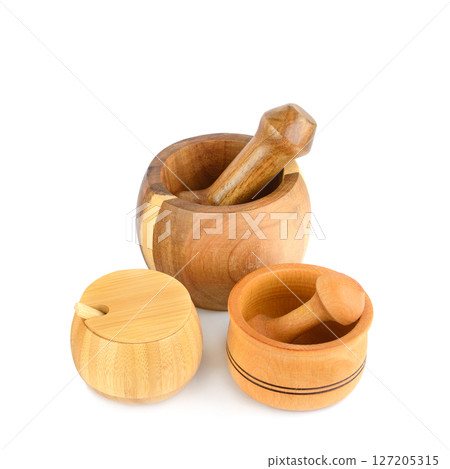 Set of Wooden mortars and pestles isolated on white 127205315